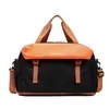 Expandable Oxford Travel Duffel with Wet/Dry Storage Black with orange trim color SKU reference