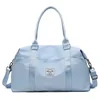 8-Color Travel Duffel with Bottle Pocket and Yoga Mat Strap Light blue color SKU reference