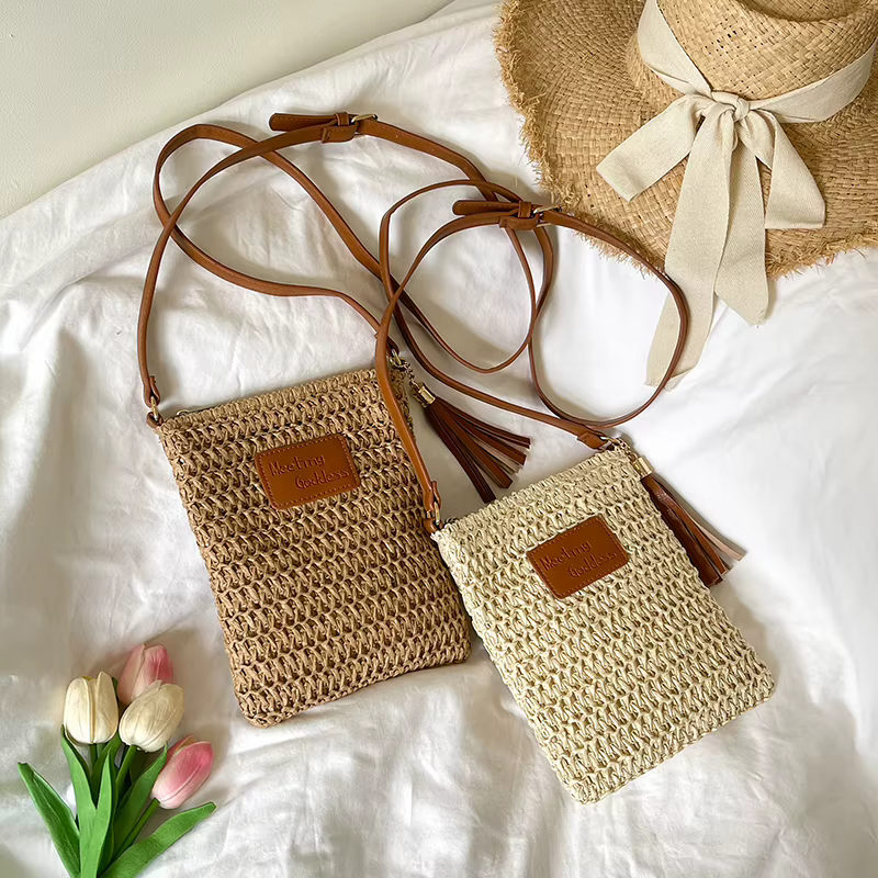 Two-Color Woven Straw Crossbody Bag with Tassel product reference image