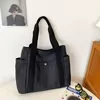 Canvas Buckle Tote with Back Zipper Pocket Black color SKU reference