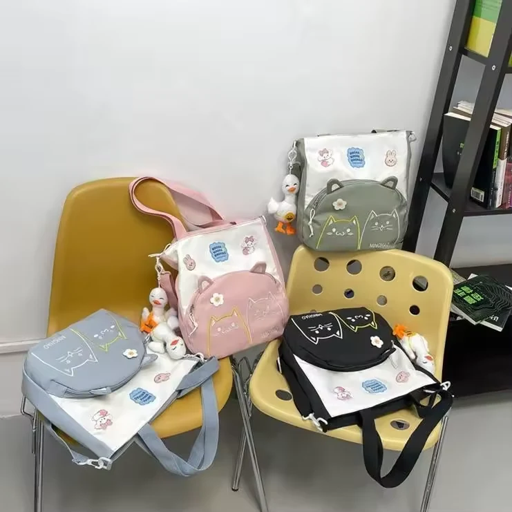 Embroidered Canvas Tote with Front Zipper Pocket product reference image