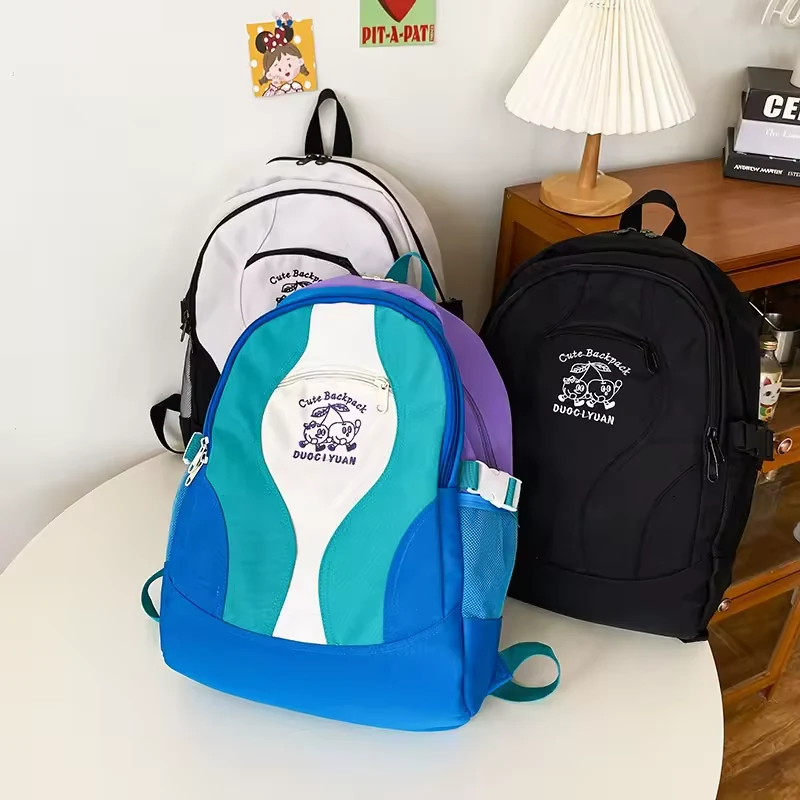 Geometric Color-Block School Backpack with Embroidery product reference image