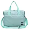 Nylon Weekender Tote with External Pocket in Two Sizes Light Blue color SKU reference