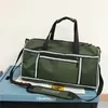 Foldable Oxford Gym Duffel with Reflective Detail and Side Mesh Pockets Green color SKU reference