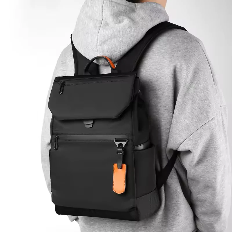 Two-Size Oxford Backpack with Magnetic Front Flap and Contrast Tag product reference image