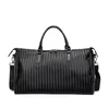 Woven-Texture PU Travel Duffel with Rivet Detail Black color SKU reference