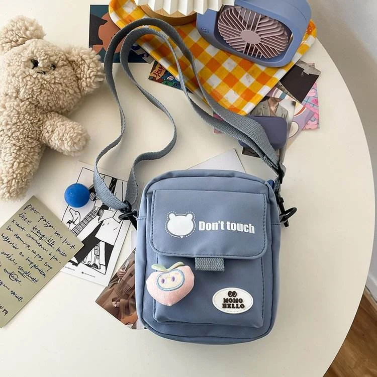 Mini Nylon Crossbody Bag with Bear Pendant & Adjustable Strap Blue color SKU reference