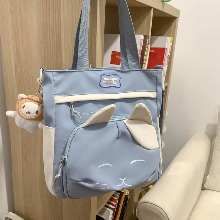 Cat-Pattern Crossbody Bag with Doll Pendant Blue color SKU reference