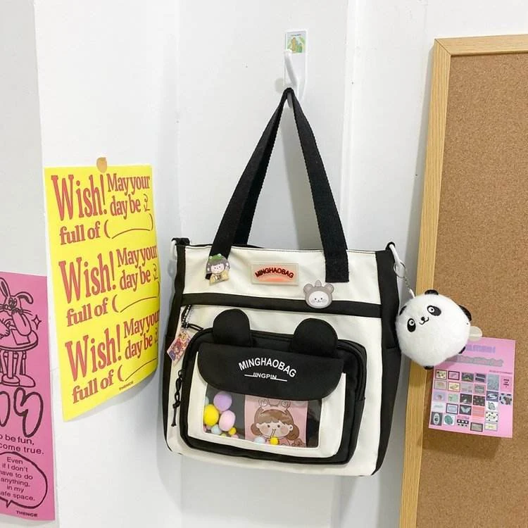 Character Shoulder Bag with Rabbit-Ear Pocket & Doll Pendant product reference image