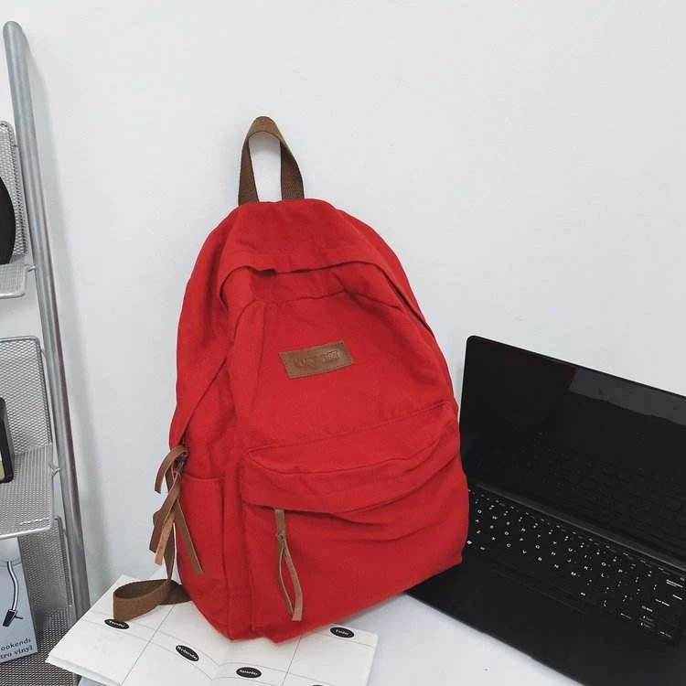 Canvas Drawstring School Backpack with Rear Zip Pocket product reference image