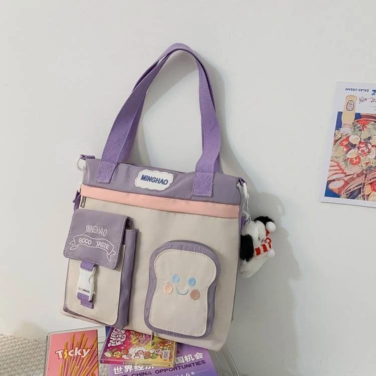 Toast-Pocket Nylon Shoulder Bag with Puppy Pendant product reference image