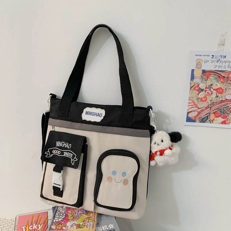 Toast-Pocket Nylon Shoulder Bag with Puppy Pendant Black color SKU reference