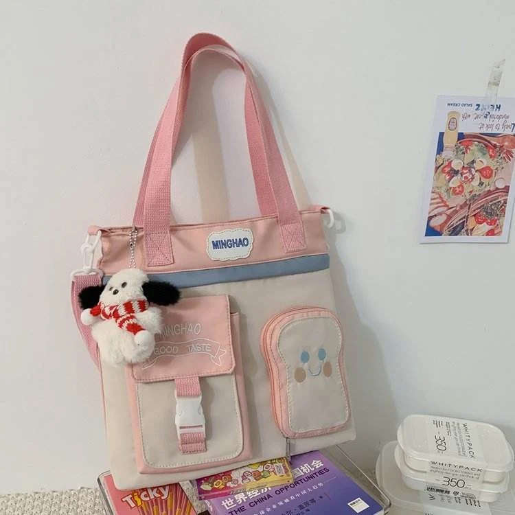 Toast-Pocket Nylon Shoulder Bag with Puppy Pendant Pink color SKU reference