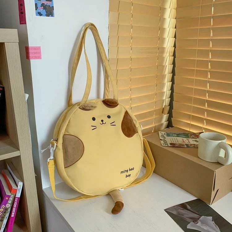 Cat-Shaped Nylon Shoulder Bag with Plush Tail Detail Yellow color SKU reference