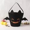 Halloween Pumpkin & Bat Canvas Trick-or-Treat Tote Black · motif 2 handle style reference