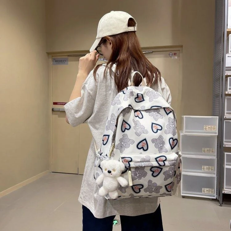 Bear-Print Nylon Student Backpack with Plush Pendant product reference image
