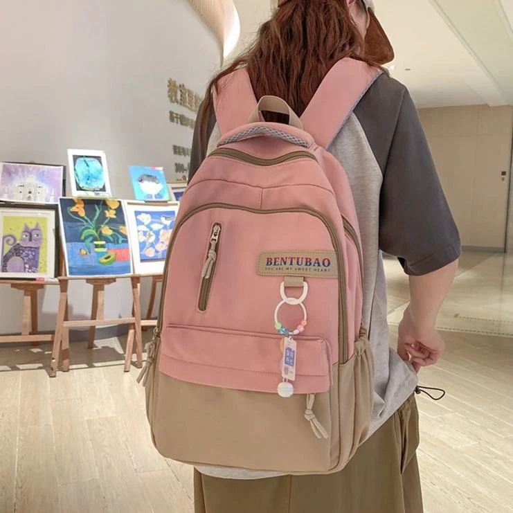Letter-Logo School Backpack with Bell Pendant product reference image