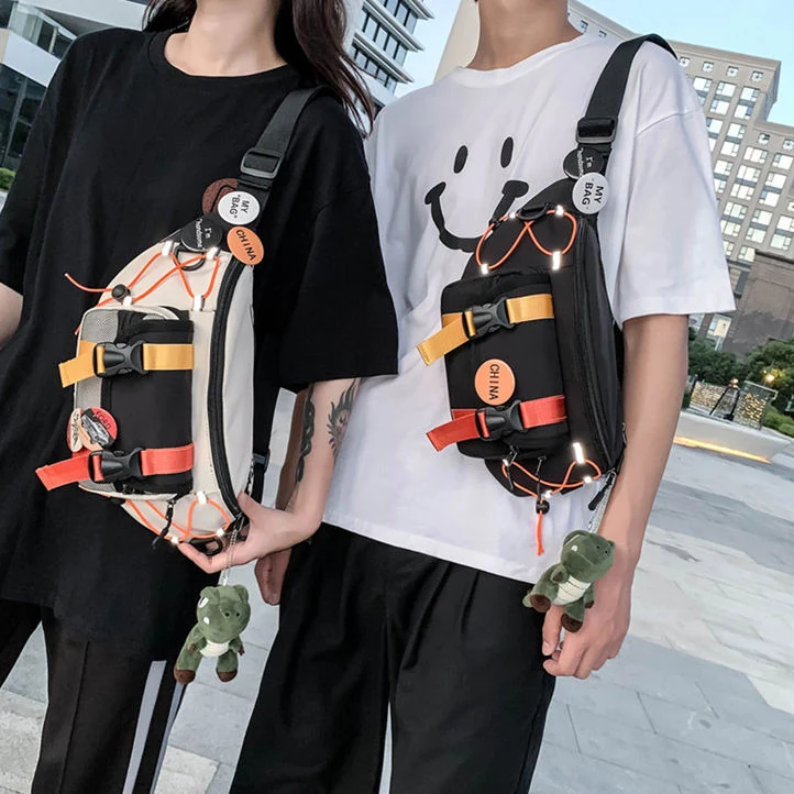 Nylon Chest and Crossbody Bag with Dinosaur Pendant product reference image